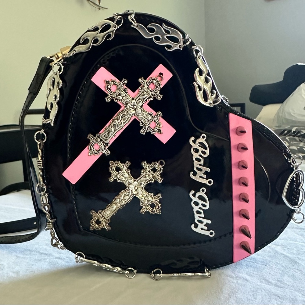 Black Heart-Shaped Bag with Pink Cross Accents